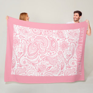 Pink floral paisley pattern on white fleece blanket