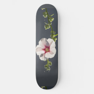Pink Flower Mallow green leaves on dark grey Skateboard