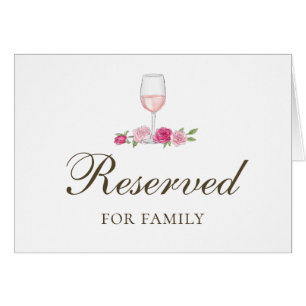 Pink flowers. Floral wedding. Roses reserved sign