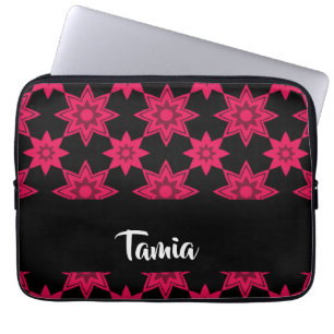 Pink flowers on black laptop sleeve