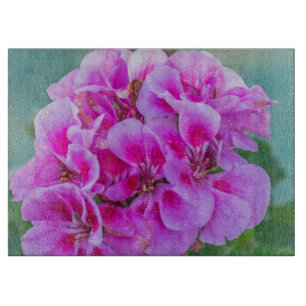 Pink geraniums glass cutting board
