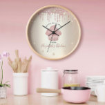 Pink Glitter Drips Cupcake Bakery Pastry Chef Gold Clock<br><div class="desc">Make a stylish impression with this elegant, sophisticated, simple, and modern custom name wall clock. A sparkly, rose gold cupcake, script handwritten typography and glitter drips overlay a faux metallic champagne gold ombre background. Personalise with your full name, business, or other info. Your choice of a round or square clock...</div>