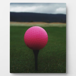 Pink Golf Ball on a mountain golf course Plaque