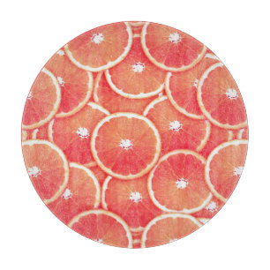 Pink grapefruit slices cutting board