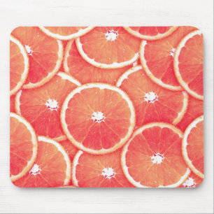 Pink grapefruit slices mouse mat