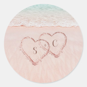 Pink hearts in the sand destination beach wedding classic round sticker