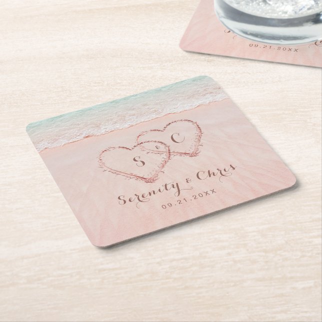 Pink hearts in the sand destination beach wedding square paper coaster (Angled)
