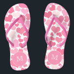 Pink Hearts Monogram Flip Flops<br><div class="desc">NewParkLane - Get ready for summer with these fun romantic monogrammed flip flops, with a pattern of hearts in different shades of pink, with a hot pink frame for your monogram. Add a vibrant & dramatic splash to your destination wedding! Easy to customise in Zazzle with your own text for...</div>