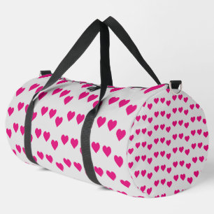 Pink hearts on grey duffle bag
