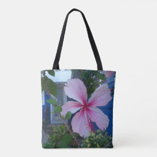 Pink hibiscus flower and blue beach cottage tote bag
