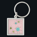 Pink Iconic Atomic Starbursts Keychain<br><div class="desc">This Pink Iconic Atomic Starbursts Keychain pattern features iconic atomic starbursts. That’s right! The old school, First Lady Pink coloured background with gold speckles is the perfect backdrop for the vibrant turquoise, soothing celery, and kitschy pear green coloured circles. The spots of colour are sporadically placed in various sizes with...</div>