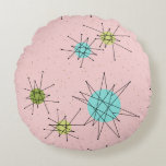 Pink Iconic Atomic Starbursts Round Pillow<br><div class="desc">This Pink Iconic Atomic Starbursts Round Pillow (large print) pattern features iconic atomic starbursts. That’s right! The old school, First Lady Pink coloured background with gold speckles is the perfect backdrop for the vibrant turquoise, soothing celery, and kitschy pear green coloured circles. The spots of colour are sporadically placed in...</div>
