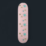 Pink Iconic Atomic Starbursts Skateboard<br><div class="desc">This Pink Iconic Atomic Starbursts Skateboard pattern features iconic atomic starbursts. That’s right! The old school, First Lady Pink coloured background with gold speckles is the perfect backdrop for the vibrant turquoise, soothing celery, and kitschy pear green coloured circles. The spots of colour are sporadically placed in various sizes with...</div>