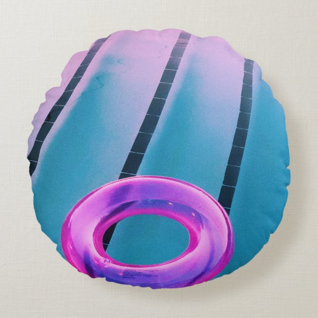 Pink inflatable ring on pool round cushion (Front)