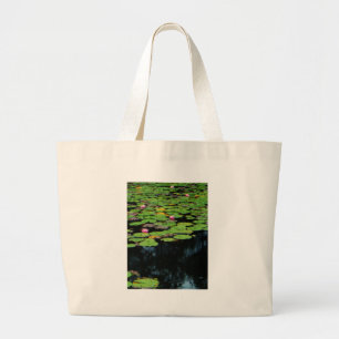 pink lotus black large tote bag