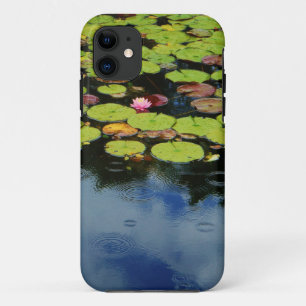 Pink lotus in Rain iPhone 11 Case