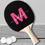 Pink Modern Script Name Monogram Ping Pong Paddle<br><div class="desc">Create Your Own Personalised Black and Pink Modern Script Name Monogram Ping Pong Paddle. This chic, girly ping pong paddle features a stylish monogram on the front with a flat, pink initial on a sleek black background, paired with a classic white script name for a personalised touch. The back is...</div>