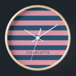 Pink Navy Stripe | Modern Trendy Preppy Name Clock<br><div class="desc">Simple,  stylish pink and navy blue nautical stripe design pattern clock in a trendy preppy design style. The name,  in modern minimalist typography,  can easily be personalised for the perfect statement accessory or gift for a loved one to stand out from the crowd!</div>