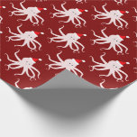 Pink Octopus in Santa Hat Christmas Maroon Wrapping Paper<br><div class="desc">Wrapping Paper with a novelty Christmas pattern of smiling,  pink,  octopus illustrations wearing Santa hats on a maroon background.</div>