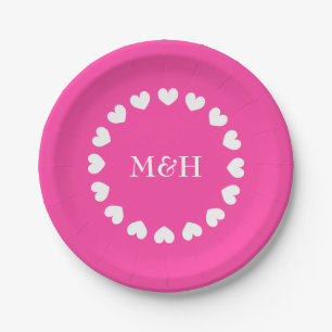 Pink paper party plates with wedding monogram