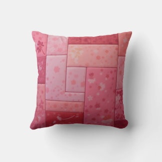 Pink patchwork cushion with a quilted feel