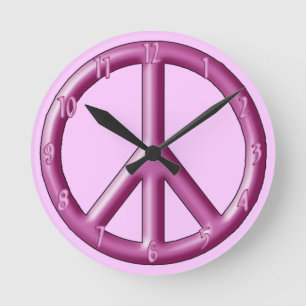 Pink peace sign wall clock. round clock