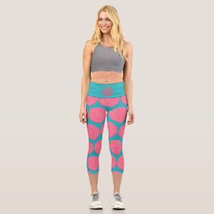 Pink peony flowers on blue romantic background capri leggings