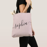 Pink Personalised Script Name Tote Bag<br><div class="desc">Chic pink and black personalised labelled tote bag with custom white name or any text for bridesmaid gifts, bachelorette parties, birthday favours, and girls trip keepsakes, and graduation gift for cute college and dorm room storage. Perfect for sports and hobby gear storage and transport. Colours and fonts are editable, just...</div>