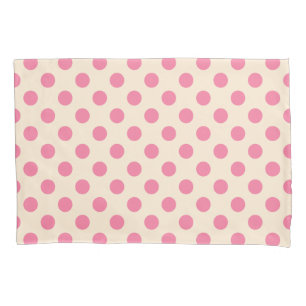 Pink polka dots on cream pillowcase