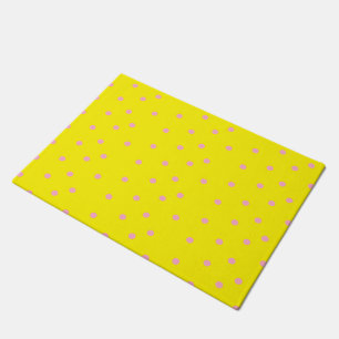 Pink polka dots on yellow doormat