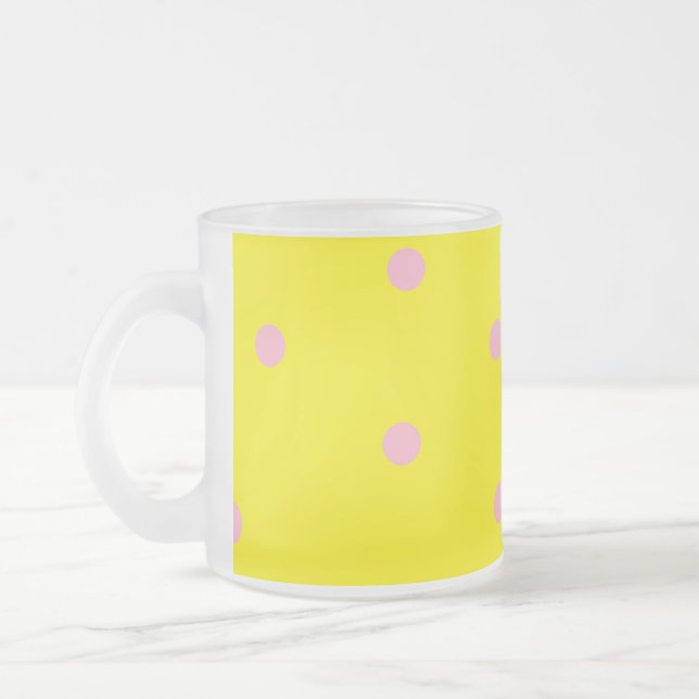 Pink polka dots on yellow  frosted glass coffee mug (Left)