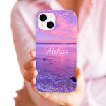 Pink Purple Ocean Sunset Girly Glam Confetti Name iPhone 15 Case<br><div class="desc">Remember your summer vacation each time you use this personalised name cell phone case. Enjoy the solitude of the California Pacific Ocean with this stunning, purple, pink and blue sunset photo, tipped with tiny, sparkly purple and gold, girly glam confetti dots. Makes a great gift for someone special! Just type...</div>