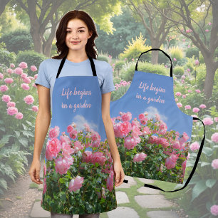Pink rose bush under blue sky, custom apron