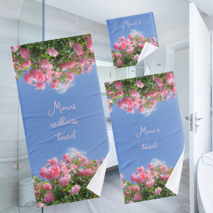 Pink rose bush under blue sky, custom bath towel set