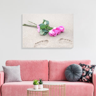pink roses and footprints in sand canvas print