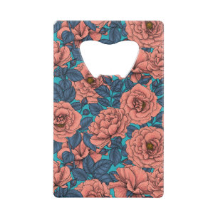Pink roses with blue leaves on blue