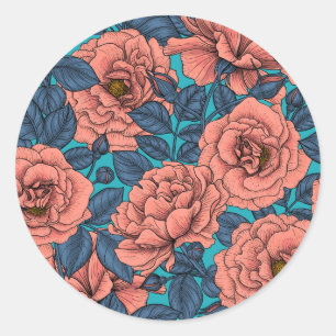 Pink roses with blue leaves on blue classic round sticker