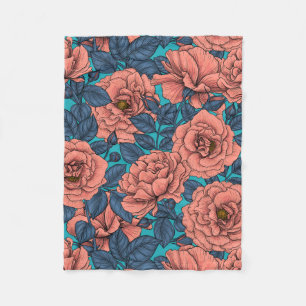 Pink roses with blue leaves on blue fleece blanket