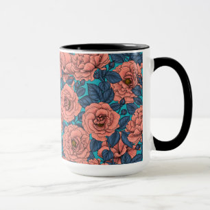 Pink roses with blue leaves on blue mug