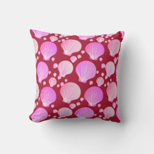 Pink seashells on a burgundy background cushion