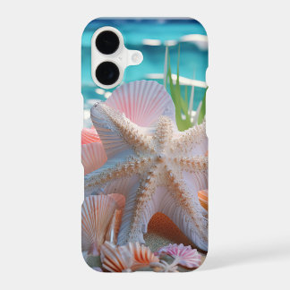 PINK STARFISH & SEASHELLS ON SANDY BEACH
