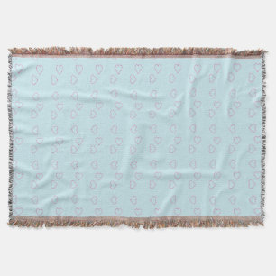 Pink stitched hearts on blue throw blanket