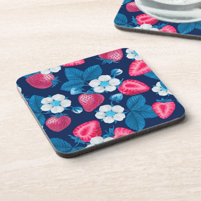 Pink strawberries on blue coaster (Left Side)