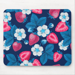 Pink strawberries on blue mouse mat