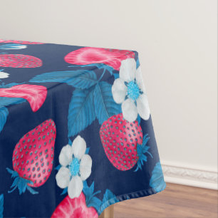Pink strawberries on blue tablecloth