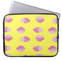 Pink strawberry cupcakes on yellow