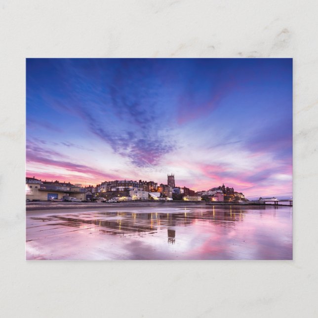 Pink sunset reflections over Cromer town at dusk Postcard (Front)