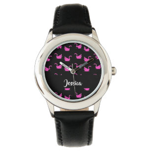 Pink swans silhouette on black watch