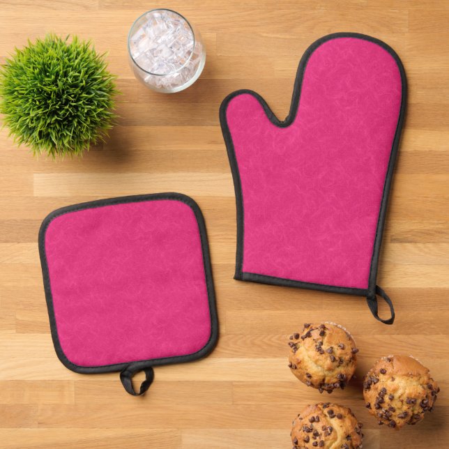 Pink textured surface with subtle swirling pattern oven mitt & pot holder set (Top Down)
