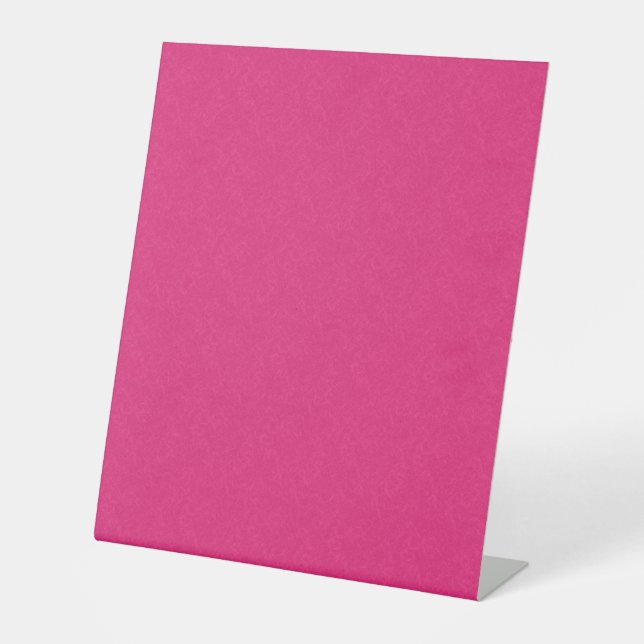 Pink textured surface with subtle swirling pattern pedestal sign (Front)